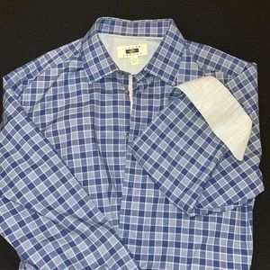 Blue Joseph Abboud dress shirt. Size large, gently worn condition.